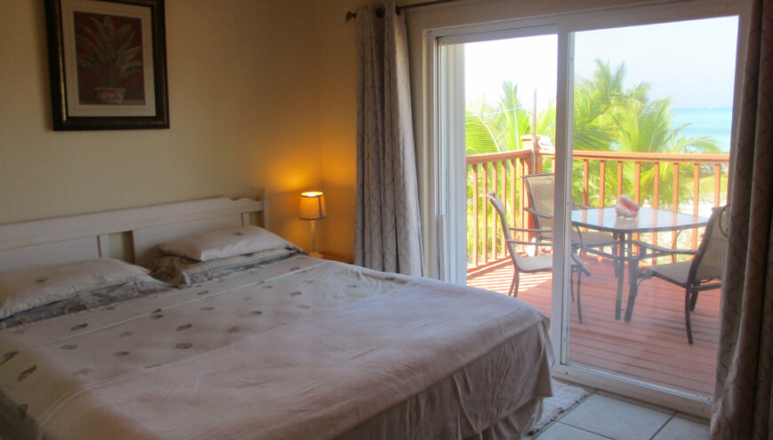 King bedroom with door to deck